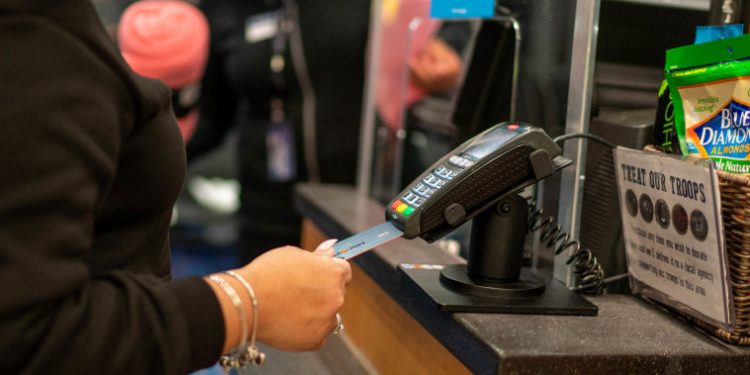 Surging Credit Card Balances: Consumers Struggle, Debt Soars to Record High of $6,360